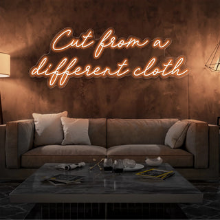 Scritta a Led Personalizzata Frasi Personalizzate "Cut from a different cloth" cm 140 x 50