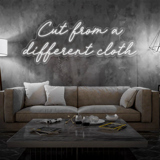 Letrero Led Personalizado Frases Personalizadas "Cut from a different cloth" 140 x 50 cm