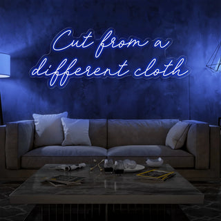 Letrero Led Personalizado Frases Personalizadas "Cut from a different cloth" 140 x 50 cm