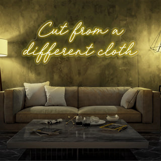 Letrero Led Personalizado Frases Personalizadas "Cut from a different cloth" 140 x 50 cm