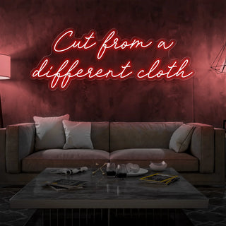 Letrero Led Personalizado Frases Personalizadas "Cut from a different cloth" 140 x 50 cm