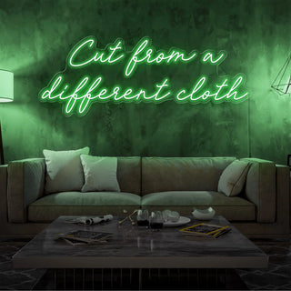 Letrero Led Personalizado Frases Personalizadas "Cut from a different cloth" 140 x 50 cm